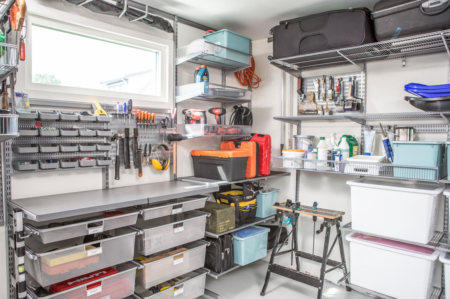 Organized residential garage with tools and storage