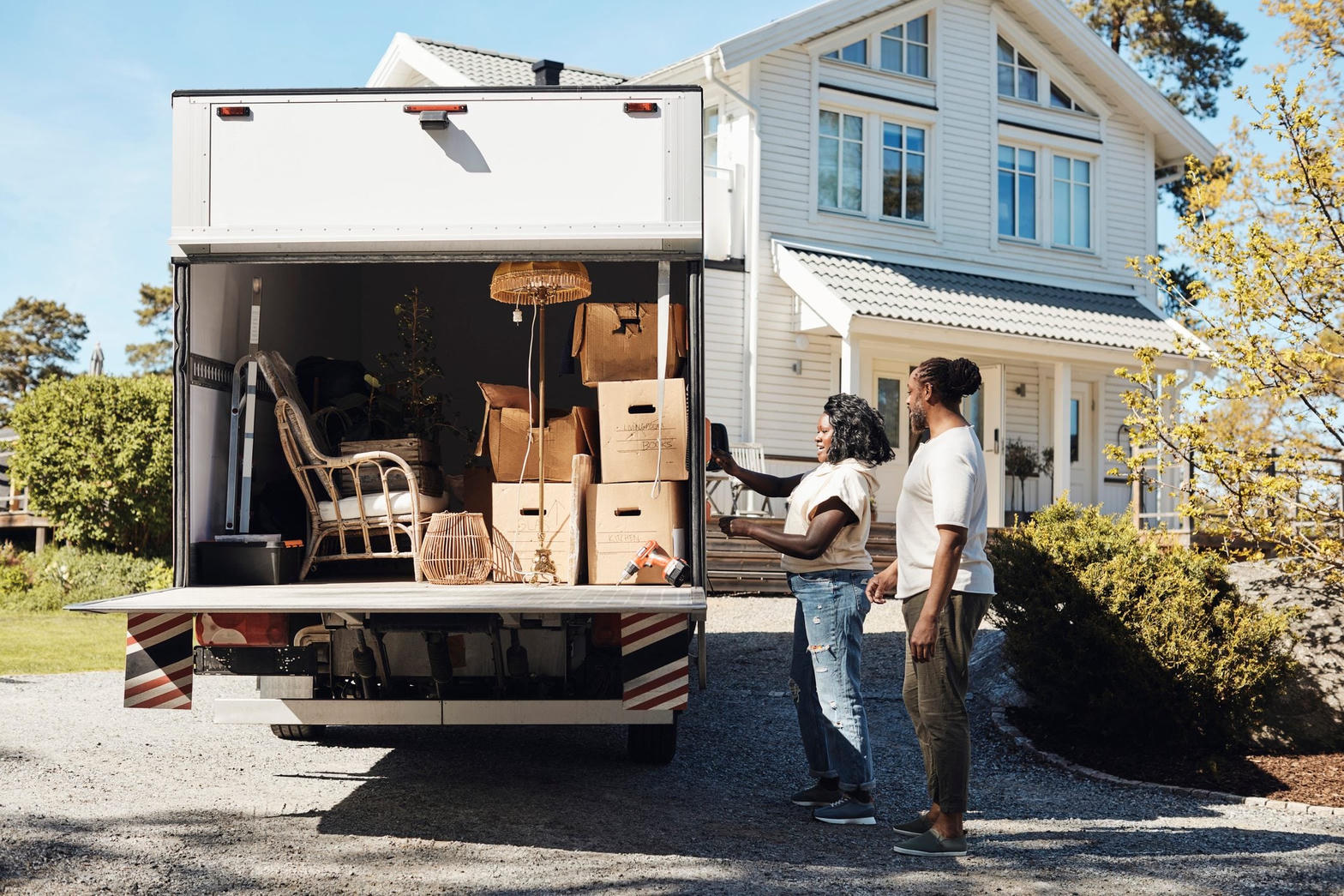 Professional moving truck loaded with furniture